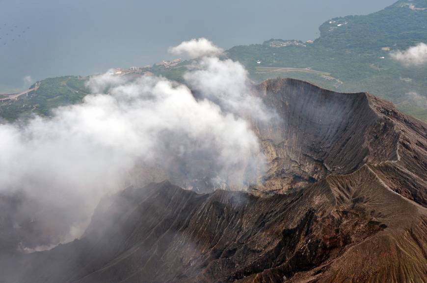Volcanic fumes rise from a crater near Minamidake peak on Mount Sakurajima at 4:57 p.m. on Saturday. | KYODO